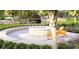 Inviting outdoor firepit area with comfortable seating and lush landscaping, perfect for cozy evenings at 232 River Edge Dr., Myrtle Beach, SC 29588
