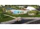 Aerial shot showcases a resort-style pool, clubhouse, playground, and waterfront access at 232 River Edge Dr., Myrtle Beach, SC 29588
