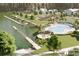 Beautiful community pool, pier, and amenities with a lake view, lush landscaping, and inviting outdoor spaces at 232 River Edge Dr., Myrtle Beach, SC 29588