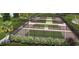 Well-maintained tennis and pickleball courts, surrounded by lush greenery, providing a recreational amenity at 232 River Edge Dr., Myrtle Beach, SC 29588