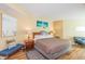 Cozy bedroom features a comfortable bed, side tables with lamps, and beach-themed decor at 2504 Ocean Blvd. # 1134, Myrtle Beach, SC 29577