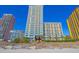 Exterior shot of a tall condo with a nice beach front view on a sunny day at 2504 Ocean Blvd. # 1134, Myrtle Beach, SC 29577