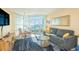 A cozy living room and dining area with ocean views, perfect for relaxing and enjoying coastal living at 2504 Ocean Blvd. # 1134, Myrtle Beach, SC 29577