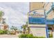 Welcome sign of Carolinian Beach Resort with display, landscaping and street at 2504 Ocean Blvd. # 1134, Myrtle Beach, SC 29577