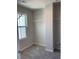 Bright and clean walk-in closet with carpet flooring and convenient shelving at 262 Christiana Ln. # C, Myrtle Beach, SC 29579