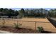 Fenced dog park with mulch ground cover and landscaping, offering a safe and enjoyable space for pets and their owners at 262 Christiana Ln. # C, Myrtle Beach, SC 29579