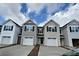 New two-story townhomes featuring attached garages and contemporary architecture under a partly cloudy sky at 262 Christiana Ln. # C, Myrtle Beach, SC 29579