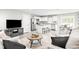 Bright open-concept living space with white accents, stainless steel appliances, and modern furnishings at 262 Christiana Ln. # C, Myrtle Beach, SC 29579