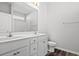 Bathroom with double sinks, white cabinets, a large mirror, and a combination shower-tub with a tile surround at 272 Stillbrook Dr., Longs, SC 29568