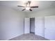 Bedroom features neutral carpet, ceiling fan, and white closet doors at 275 Stillbrook Dr., Longs, SC 29568