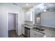 Cozy kitchen area with stainless steel appliances, granite countertops, and white cabinets at 275 Stillbrook Dr., Longs, SC 29568