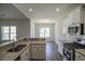 Modern kitchen featuring granite countertops, stainless steel appliances, and white cabinetry at 275 Stillbrook Dr., Longs, SC 29568