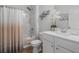 Bright bathroom with a shower and tub combo and framed mirror at 2882 Ophelia Way, Myrtle Beach, SC 29577