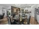 Bright dining area features a glass table, seating for six, and stylish decor at 2882 Ophelia Way, Myrtle Beach, SC 29577