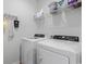 Bright laundry room featuring a Frigidaire washer and dryer, shelving, and ample storage space at 2882 Ophelia Way, Myrtle Beach, SC 29577