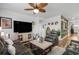 Well-decorated living room featuring comfortable seating, decorative anchor, and wood-look floors offering a cozy retreat at 2882 Ophelia Way, Myrtle Beach, SC 29577