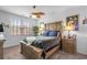Comfortable main bedroom featuring a decorative ceiling fan and large window at 2882 Ophelia Way, Myrtle Beach, SC 29577