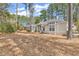 Inviting single-story home with manicured landscaping and mature trees at 3026 Cedar Creek Run, Little River, SC 29566