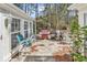 Inviting patio with a grill, comfortable seating, and lush greenery for outdoor enjoyment at 3026 Cedar Creek Run, Little River, SC 29566