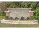 A close view of Plantation Point neighborhood sign featuring manicured landscaping at 3700 Waterford Dr., Myrtle Beach, SC 29577