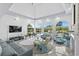 Bright living room boasting large windows, stylish furniture, and elegant marble floors at 3700 Waterford Dr., Myrtle Beach, SC 29577