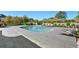 Backyard features a luxurious pool with ample lounge space and refined landscaping at 3700 Waterford Dr., Myrtle Beach, SC 29577