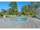 Private swimming pool surrounded by lounge chairs and lush landscaping in a backyard oasis at 3700 Waterford Dr., Myrtle Beach, SC 29577