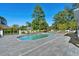 Resort-style backyard features a private pool, lounge chairs, and lush landscaping at 3700 Waterford Dr., Myrtle Beach, SC 29577