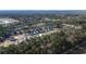 Aerial view of a residential community surrounded by trees and water in a rural setting at 397 Wingspan Ct., Myrtle Beach, SC 29588
