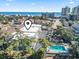 Panoramic aerial view of the property showcasing the building, pool, and proximity to the ocean at 401 Hillside Dr. N # 2F, North Myrtle Beach, SC 29582