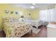 Bright bedroom features two beds with seashell coverings and a full dresser at 401 Hillside Dr. N # 2F, North Myrtle Beach, SC 29582