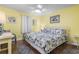 Comfortable bedroom with coastal decor, including a plush bed and serene ambiance at 401 Hillside Dr. N # 2F, North Myrtle Beach, SC 29582