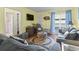 Comfortable living room features hardwood floors, sliding door, and a cozy seating area at 401 Hillside Dr. N # 2F, North Myrtle Beach, SC 29582