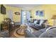 Relaxing living room featuring a comfortable seating area and outdoor patio access at 401 Hillside Dr. N # 2F, North Myrtle Beach, SC 29582