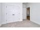 Bedroom showcasing closet with bi-fold doors and neutral carpeting at 4028 Bucolic Loop, Myrtle Beach, SC 29588