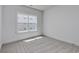 Bright bedroom featuring plush carpeting and a large window at 4028 Bucolic Loop, Myrtle Beach, SC 29588