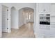 Hallway featuring arched entryways and modern recessed lighting at 4028 Bucolic Loop, Myrtle Beach, SC 29588