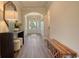 Inviting hallway with elegant arched openings, stylish wood floors and contemporary decor at 4028 Bucolic Loop, Myrtle Beach, SC 29588