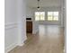 Open concept living area boasting wood floors and fireplace at 4028 Bucolic Loop, Myrtle Beach, SC 29588