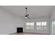 Spacious living area with a fireplace and ample natural light at 4028 Bucolic Loop, Myrtle Beach, SC 29588