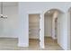 Walk-in pantry features ample shelving for organized storage solutions at 4028 Bucolic Loop, Myrtle Beach, SC 29588