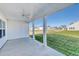 Covered patio featuring a ceiling fan and a view of the lawn at 4028 Bucolic Loop, Myrtle Beach, SC 29588
