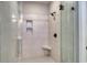 Modern walk-in shower with tile surround, corner seat and glass door at 4028 Bucolic Loop, Myrtle Beach, SC 29588
