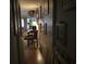Hallway view into a cozy living space with hardwood floors and natural light at 405 Cambridge Circle # B5, Murrells Inlet, SC 29576