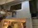 Living area showing artwork, decor, staircase, and open loft space at 405 Cambridge Circle # B5, Murrells Inlet, SC 29576