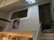 Interior shot of a living area and staircase that leads up to an open loft space at 405 Cambridge Circle # B5, Murrells Inlet, SC 29576