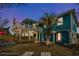 Outdoor space featuring multi-level deck and lush green yard with palm tree at 409 25Th Ave. N, North Myrtle Beach, SC 29582