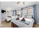 Bright bedroom features two beds, beachy decor, and warm wood floors at 409 25Th Ave. N, North Myrtle Beach, SC 29582