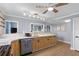 Well-lit kitchen featuring stainless steel appliances, ample counter space, and modern track lighting at 409 25Th Ave. N, North Myrtle Beach, SC 29582