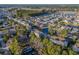 An aerial view showcases a vast residential area with multiple ponds and water features at 4173 Hibiscus Dr. # 204, Little River, SC 29566